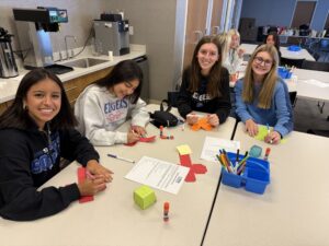 Students actively engage with an interactive workshop on Jewish identity at JMM.